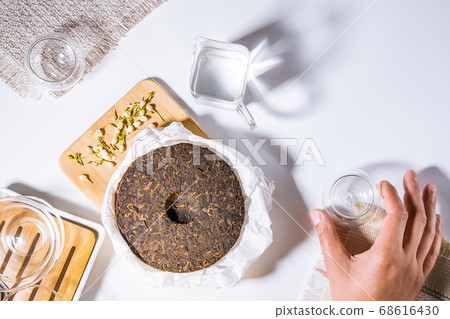 Chinese Shu pu-erh tea. tea ceremony top view, flat lay. healthy food healthy drinks herbal tea Chinese Shu pu-erh tea. tea ceremony top view, flat lay. healthy food healthy drinks herbal tea 68616430