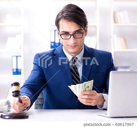 Lawyer receiving money as bribe Lawyer receiving money as bribe 68617867