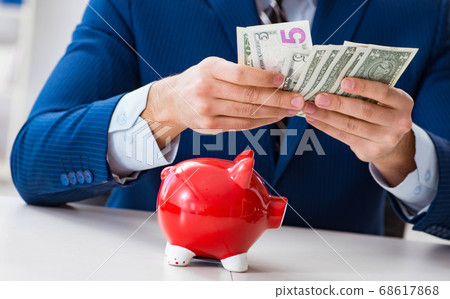 Businessman thinking about his savings during crisis Businessman thinking about his savings during crisis 68617868