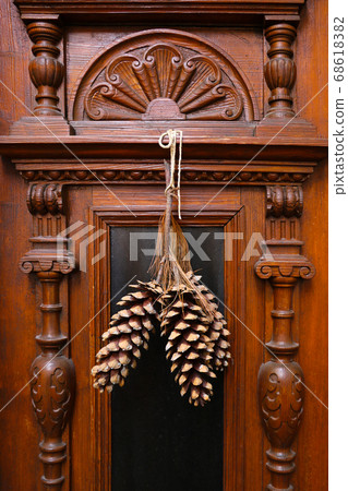 Big bumps hang on the front door of the house. Big bumps hang on the front door of the house. 68618382