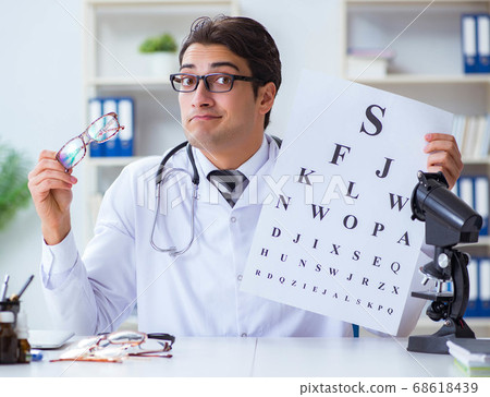Eye doctor in medical concept Eye doctor in medical concept 68618439