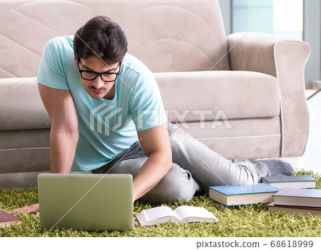 Student preparing for university exams at home 68618999