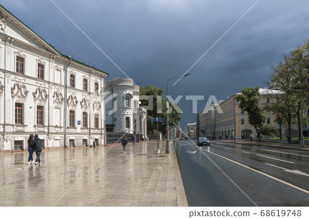 Vozdvizhenka street in Moscow. The sun after rain. Vozdvizhenka street in Moscow. The sun after rain. 68619748