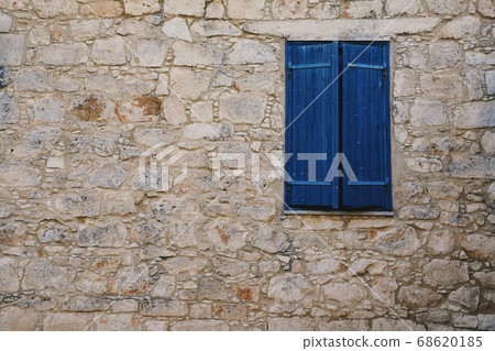 Old Brick Facade With Window in Greek Village 68620185