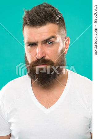 Beard fashion and barber concept. Strict and Beard fashion and barber concept. Strict and 68620915