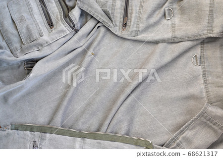 The texture of the fabric is olive-colored, which 68621317