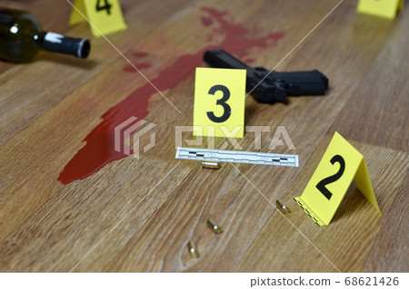 Murder concept - gun with blood and wine bottle on Murder concept - gun with blood and wine bottle on 68621426