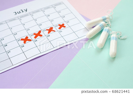 Flat lay composition with calendar and menstrual Flat lay composition with calendar and menstrual 68621441