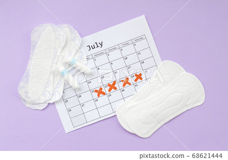 Menstrual pads and tampons on menstruation period Menstrual pads and tampons on menstruation period 68621444