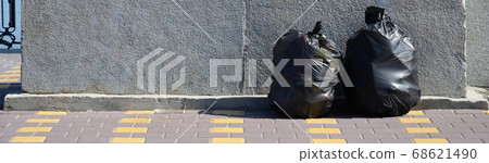 Two Big Black Trash Bag On Stock Photo 1034164576