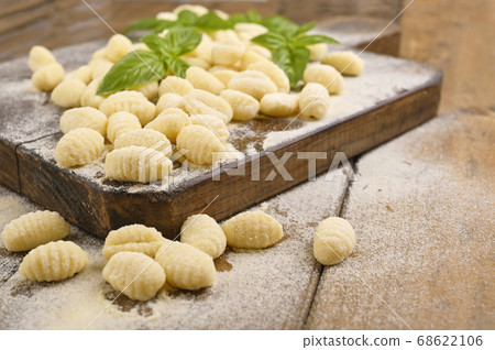 Gnocchi with potatoes. Traditional italian food from Rome, Sardinia, south of italy. Homemade Gnocchi with potatoes. Traditional italian food from Rome, Sardinia, south of italy. Homemade 68622106