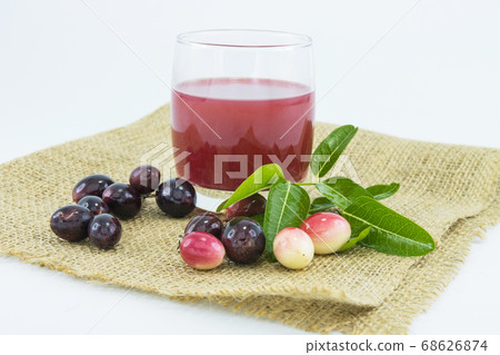 fresh Carissa carandas glass of juice with Carissa carandas fruits and Healthy drinks concept.. 68626874