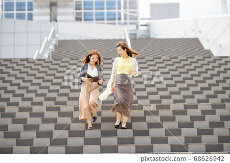 OL going down the stairs in the afternoon 68626942
