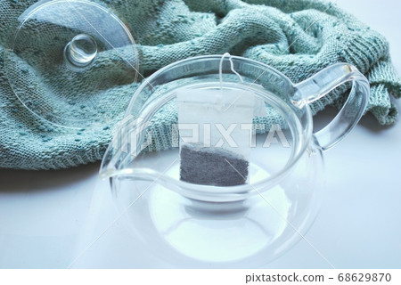Glass teapot and teabag Glass teapot and teabag 68629870