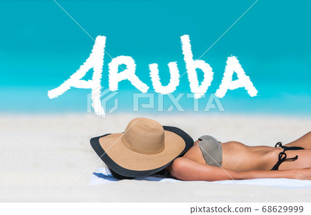 ARUBA text written on beach sky vacation woman 68629999