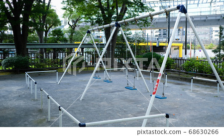 Swing in the city park Swing in the city park 68630266