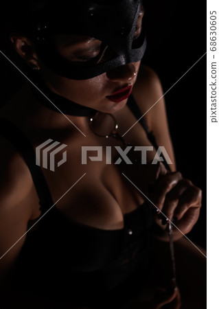 Brunette girl in a cat mask 68630605