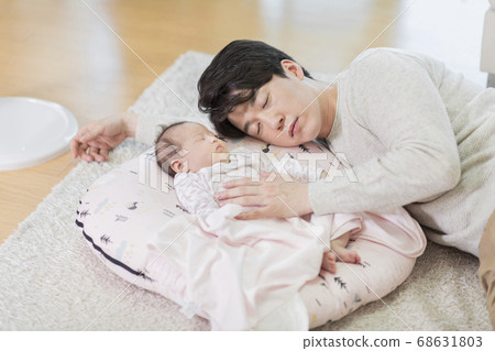 Modern young family concept, young mother and father with newborn 500 Modern young family concept, young mother and father with newborn 500 68631803