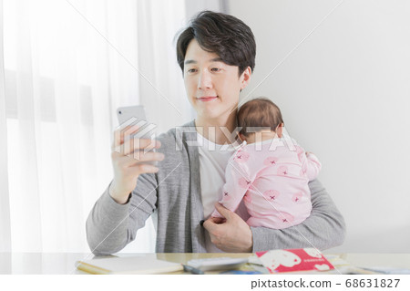Modern young family concept, young mother and father with newborn 480 Modern young family concept, young mother and father with newborn 480 68631827