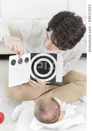 Modern young family concept, young mother and father with newborn 402 Modern young family concept, young mother and father with newborn 402 68631921