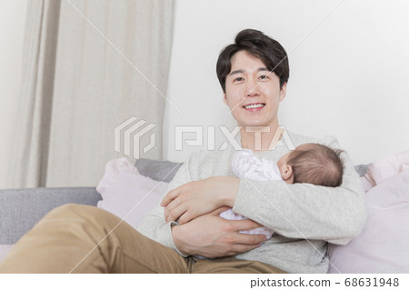 Modern young family concept, young mother and father with newborn 381 Modern young family concept, young mother and father with newborn 381 68631948