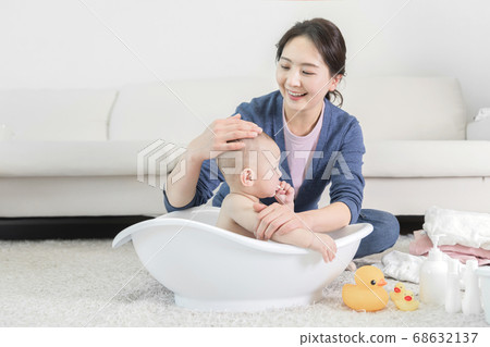 Modern young family concept, young mother and father with newborn 176 Modern young family concept, young mother and father with newborn 176 68632137