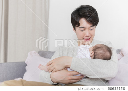 Modern young family concept, young mother and father with newborn 375 Modern young family concept, young mother and father with newborn 375 68632158
