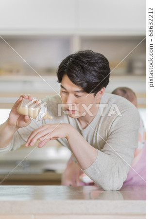 Modern young family concept, young mother and father with newborn 598 Modern young family concept, young mother and father with newborn 598 68632212