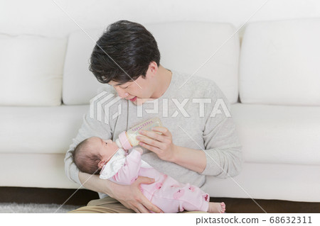 Modern young family concept, young mother and father with newborn 437 Modern young family concept, young mother and father with newborn 437 68632311