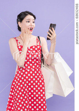 Life style concept, happy shopping time. Young asian woman with shopping bags and cart. 506 Life style concept, happy shopping time. Young asian woman with shopping bags and cart. 506 68632408