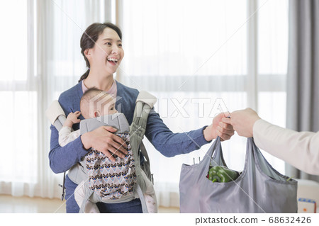Modern young family concept, young mother and father with newborn 217 Modern young family concept, young mother and father with newborn 217 68632426