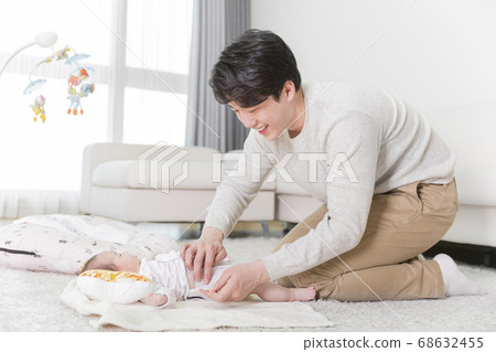 Modern young family concept, young mother and father with newborn 396 Modern young family concept, young mother and father with newborn 396 68632455