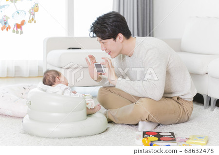 Modern young family concept, young mother and father with newborn 393 Modern young family concept, young mother and father with newborn 393 68632478