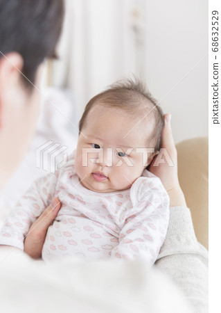 Modern young family concept, young mother and father with newborn 378 68632529