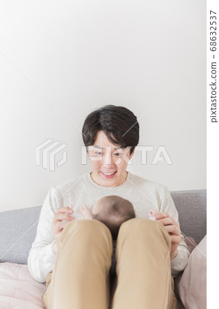 Modern young family concept, young mother and father with newborn 370 Modern young family concept, young mother and father with newborn 370 68632537