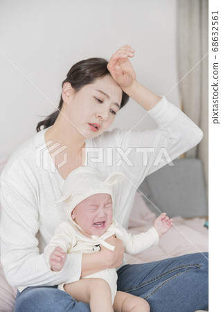 Modern young family concept, young mother and father with newborn 321 68632561