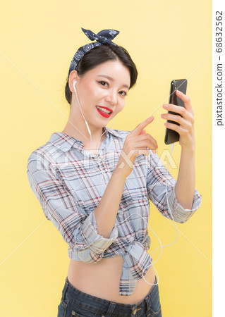 Life style concept, happy shopping time. Young asian woman with shopping bags and cart. 381 Life style concept, happy shopping time. Young asian woman with shopping bags and cart. 381 68632562