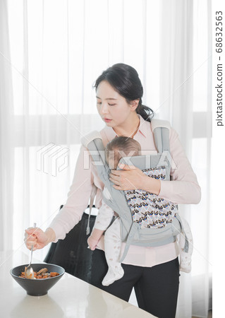 Modern young family concept, young mother and father with newborn 319 68632563