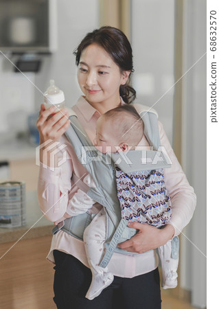 Modern young family concept, young mother and father with newborn 257 Modern young family concept, young mother and father with newborn 257 68632570