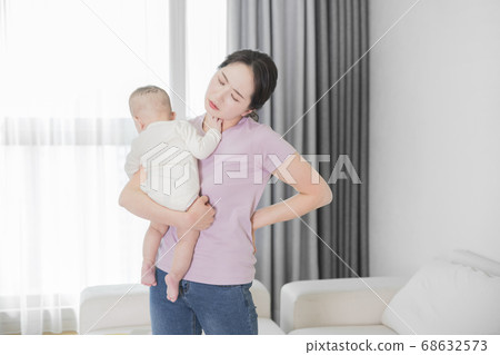 Modern young family concept, young mother and father with newborn 334 Modern young family concept, young mother and father with newborn 334 68632573