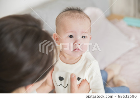 Modern young family concept, young mother and father with newborn 329 Modern young family concept, young mother and father with newborn 329 68632590