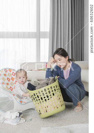 Modern young family concept, young mother and father with newborn 323 68632602