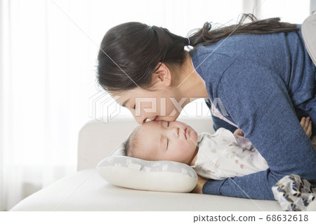 Modern young family concept, young mother and father with newborn 254 Modern young family concept, young mother and father with newborn 254 68632618