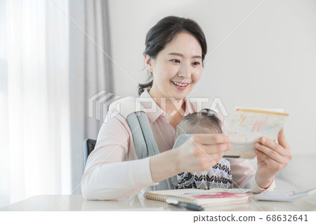 Modern young family concept, young mother and father with newborn 242 Modern young family concept, young mother and father with newborn 242 68632641