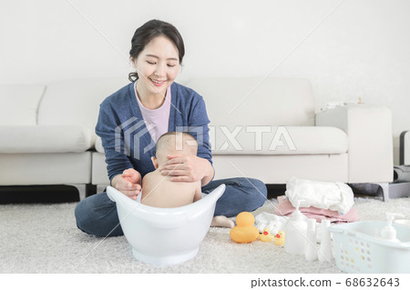 Modern young family concept, young mother and father with newborn 181 Modern young family concept, young mother and father with newborn 181 68632643
