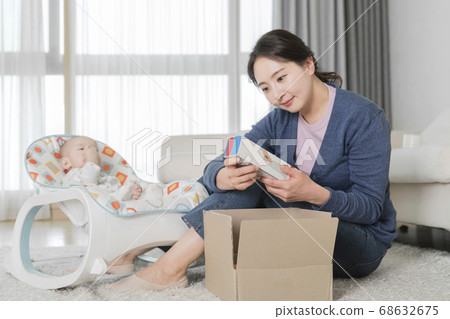 Modern young family concept, young mother and father with newborn 215 Modern young family concept, young mother and father with newborn 215 68632675