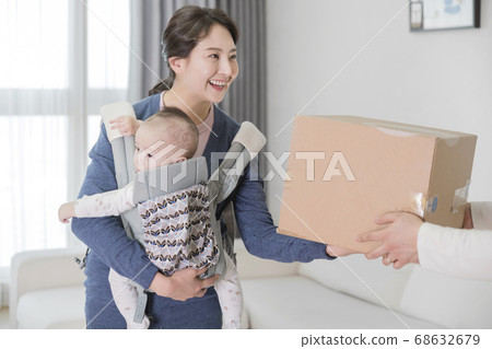 Modern young family concept, young mother and father with newborn 212 Modern young family concept, young mother and father with newborn 212 68632679