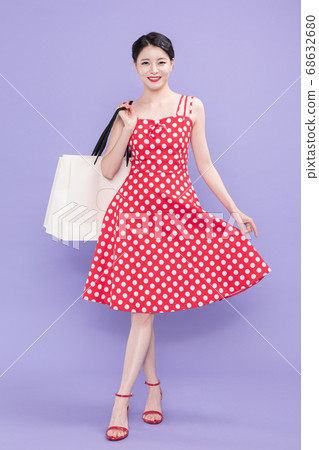 Life style concept, happy shopping time. Young asian woman with shopping bags and cart. 520 Life style concept, happy shopping time. Young asian woman with shopping bags and cart. 520 68632680