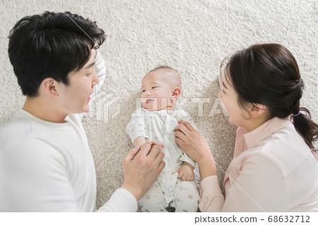 Modern young family concept, young mother and father with newborn 112 Modern young family concept, young mother and father with newborn 112 68632712