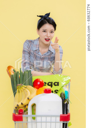 Life style concept, happy shopping time. Young asian woman with shopping bags and cart. 487 68632774
